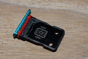 不用取卡针的手机取卡槽方法（手机取卡槽的简便技巧）